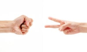 hands playing rock paper scissors