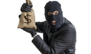 comical bank robber on white background