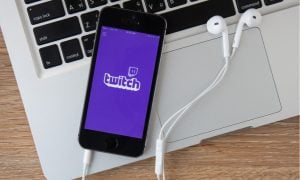 Mobile phone with Twitch on laptop