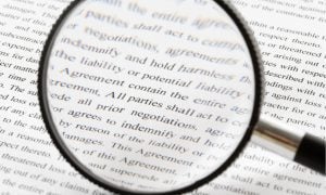 magnifying glass on fine print