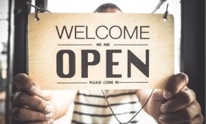 hands on OPEN sign