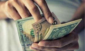 male hands counting money