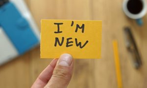 I'm new written on yellow paper
