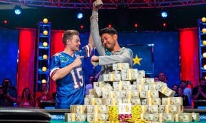 Poker tournament winner with piles of money