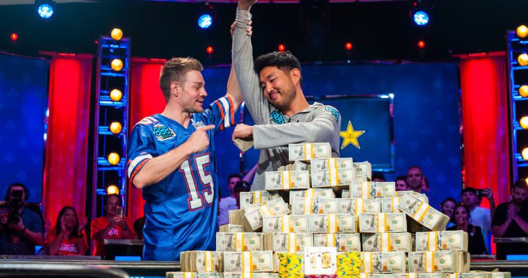Poker tournament winner with piles of money