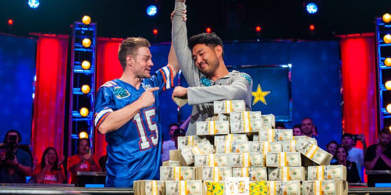 Poker tournament winner with piles of money