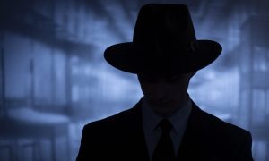 shadow of a man in a hat