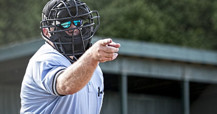 baseball umpire calling a strike