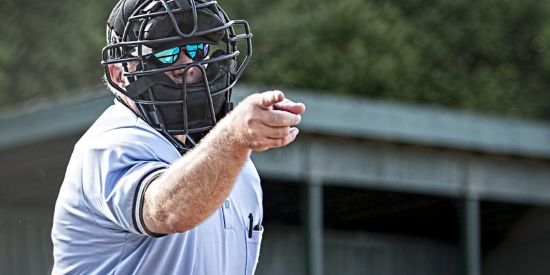 baseball umpire calling a strike