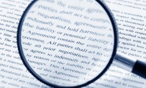 Document under magnifying glass