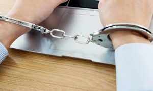 A picture of someone handcuffed