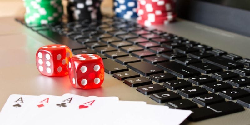 A picture of dice and cards on a table