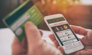 Mobile sports betting app on a phone
