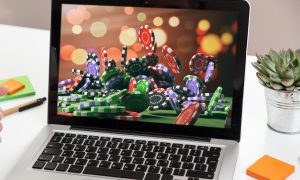 Casino chips on a laptop screen