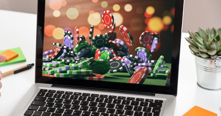 Casino chips on a laptop screen