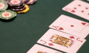 Poker cards on a green table