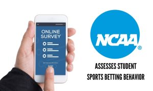 person taking online survey on phone represents students participating in ncaa sports betting survey