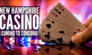 Hand Displays Card Game With Poker Chips Background and New Hampshire casino coming to Concord