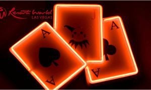 Neon Playing Cards with Resorts World Logo. Updates on the Las Vegas casino's rewards program