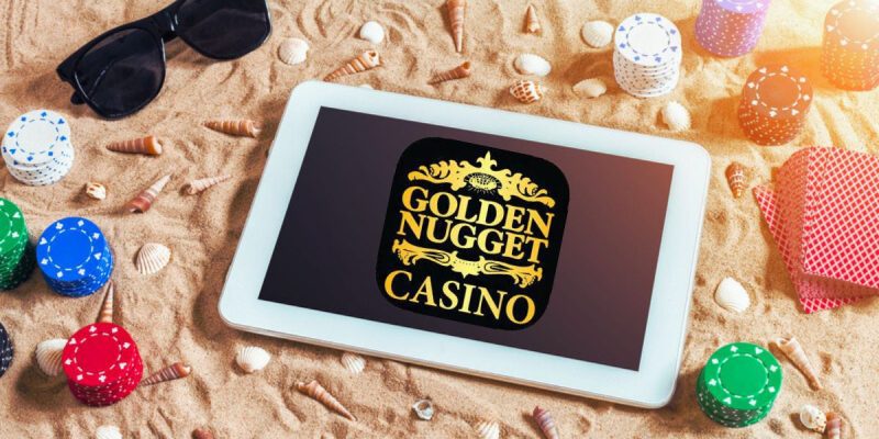 Tablet on a Sandy Beach with poker chips and Golden Nugget casino logo