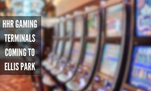 a blurred picture of slot machines representing historical horse racing terminals that will be at ellis park