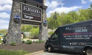 a foxwoods casino van is parked outside the entrance to the casino in connecticut