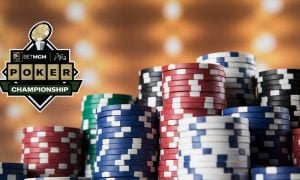 poker chips in a stack beside the betmgm poker championship at aria logo