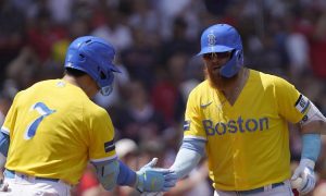 boston red sox teammates justin turner and matasha yoshida slap hands