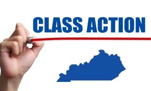 hand writing class action above an outline of the state of kentucky