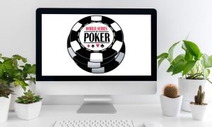 desktop computer with wsop logo on screen