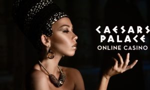 egyptian woman holding up caesars palace online casino logo