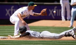 Chicago White Sox's Zach Remillard Slides Into Third Base