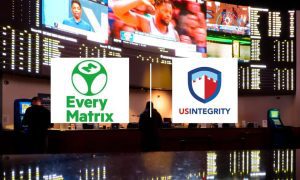 People Making Bets At Ocean Casino Resort Sportsbook with EveryMatrix and US Integrity logos