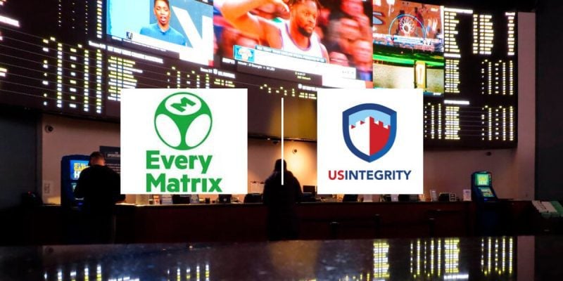People Making Bets At Ocean Casino Resort Sportsbook with EveryMatrix and US Integrity logos