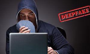 man holding cards on computer
