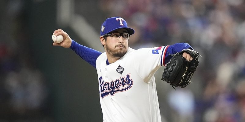 Dane Dunning throws pitch