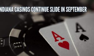 playing cards resting on gambling chips