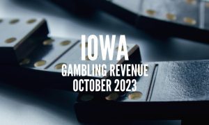 Black Dominos Laying On Table with Iowa gambling revenue October 2023