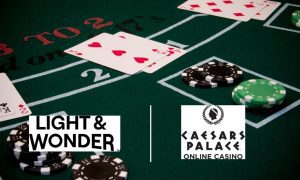 Blackjack Table With Cards And Chips with Light & Wonder and Caesars Palace Online Casino logos