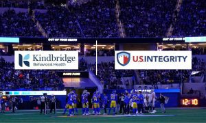 Rams Raiders NFL Football Game Stadium with Kindbridge and US Integrity logos