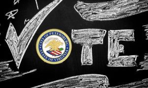 Word Vote Written In White Chalk with flag of Petersburg, VA