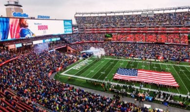 Gillette Stadium With Giant American Flag On Field