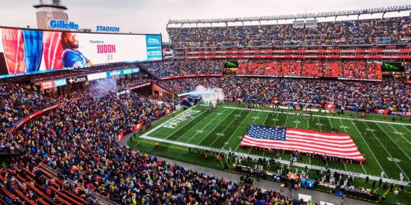 Gillette Stadium With Giant American Flag On Field
