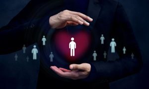 Man Holds Person In Heart to signify support