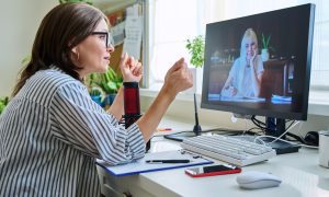 people conversing via web call