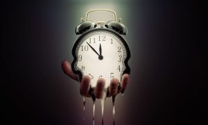 Hand Holding Melting Clock
