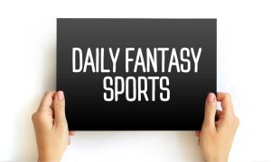 Hands Hold Daily Fantasy Sports Sign