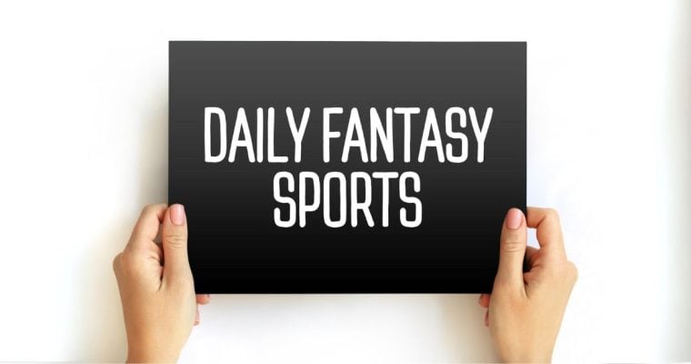 Hands Hold Daily Fantasy Sports Sign