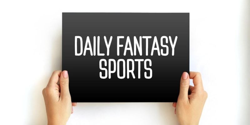 Hands Hold Daily Fantasy Sports Sign