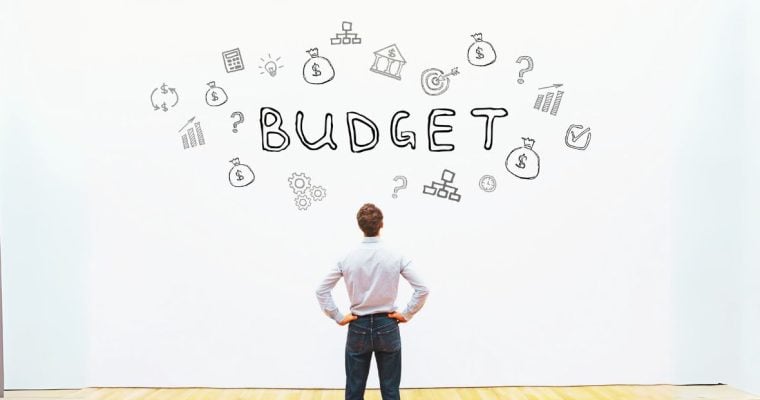 Man Budget Wall Financial Concept